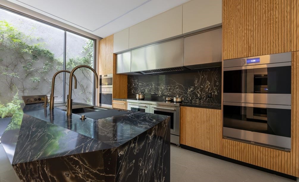 Inside the Sub-Zero, Wolf, and Cove Showroom in Mexico City featuring built-in Wolf appliances like ovens and ranges.