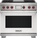 Wolf 36" 4 Burner Dual Fuel Range with Infrared Griddle (DF36450G/WH/P) featuring white accent colored door and signature red Wolf knobs.