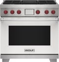Wolf 36&quot; 4 Burner Dual Fuel Range with Infrared Charbroiler (DF36450C/WH/P) featuring white accent colored door and signature red Wolf knobs.