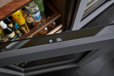 Aerial view of Sub-Zero 24" Designer Undercounter ADA Height Beverage Center - Panel Ready (DEU2450BG/ADA) door with touchscreen panel for settings control