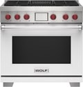 Wolf 36" 4 Burner Dual Fuel Range with Infrared Charbroiler (DF36450C/WH/P) featuring white accent colored door and signature red Wolf knobs.