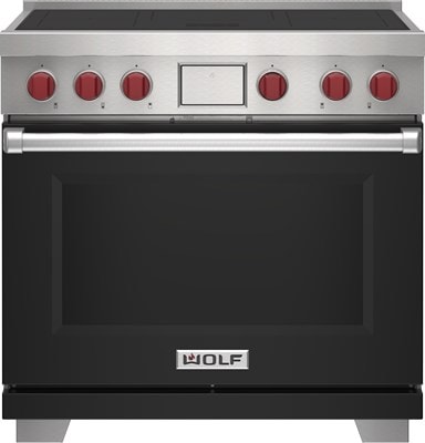 Range with black panel door and red knobs.