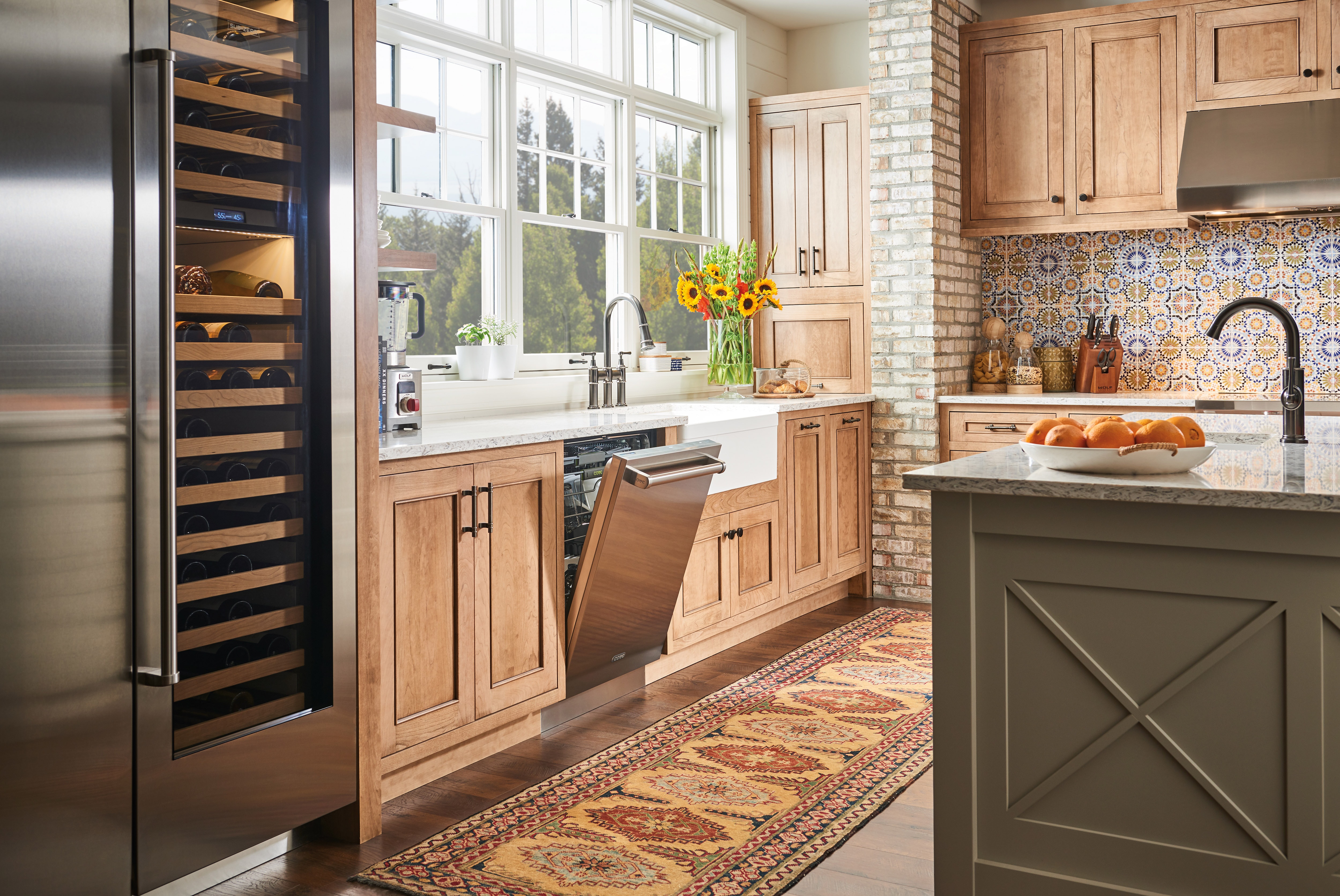 The Cove 24" Dishwasher with Water Softener Panel Ready (DW2450WS) featured with Sub-Zero 24" Designer Wine Storage Panel Ready (IW-24).