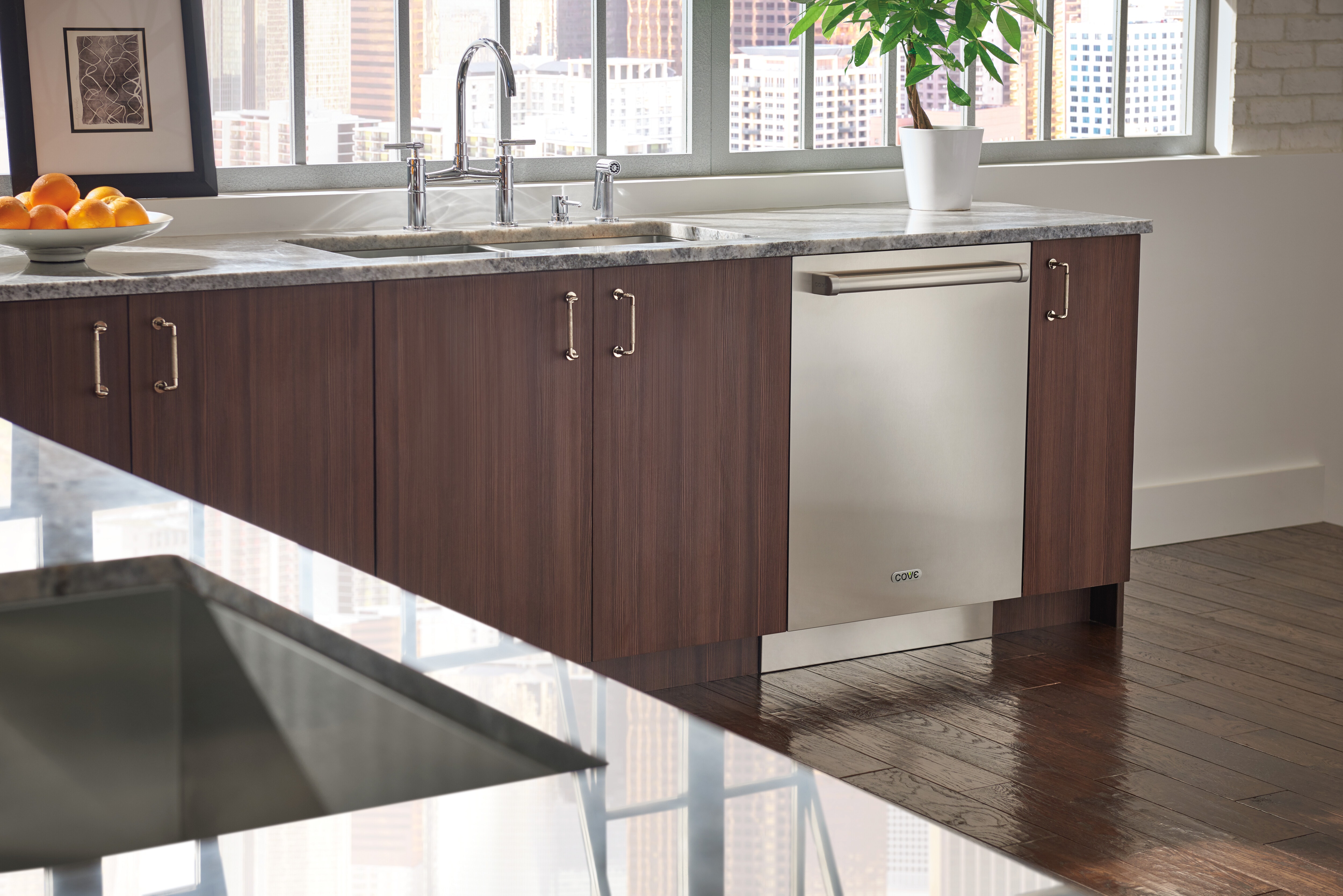 The Cove 24" Dishwasher (DW2450WS) offers a clean modern feel thanks to a panel ready design that accepts stainless panels and handles.