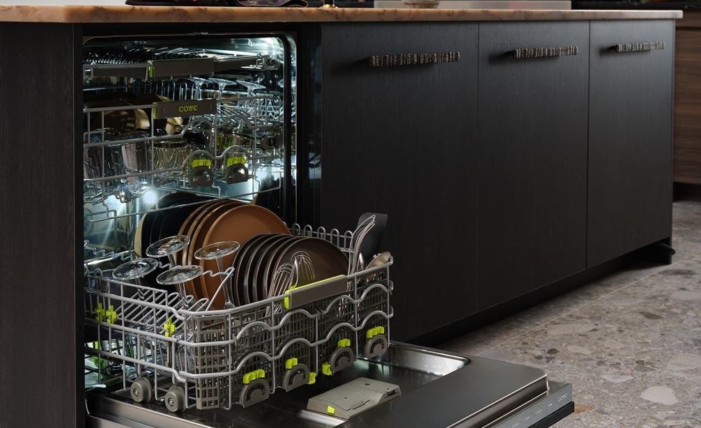 24 inch Panel Ready Built In Dishwasher with Water Softener (DW2451WS) by Cove Dishwashers shown set flush in charcoal kitchen cabinets.