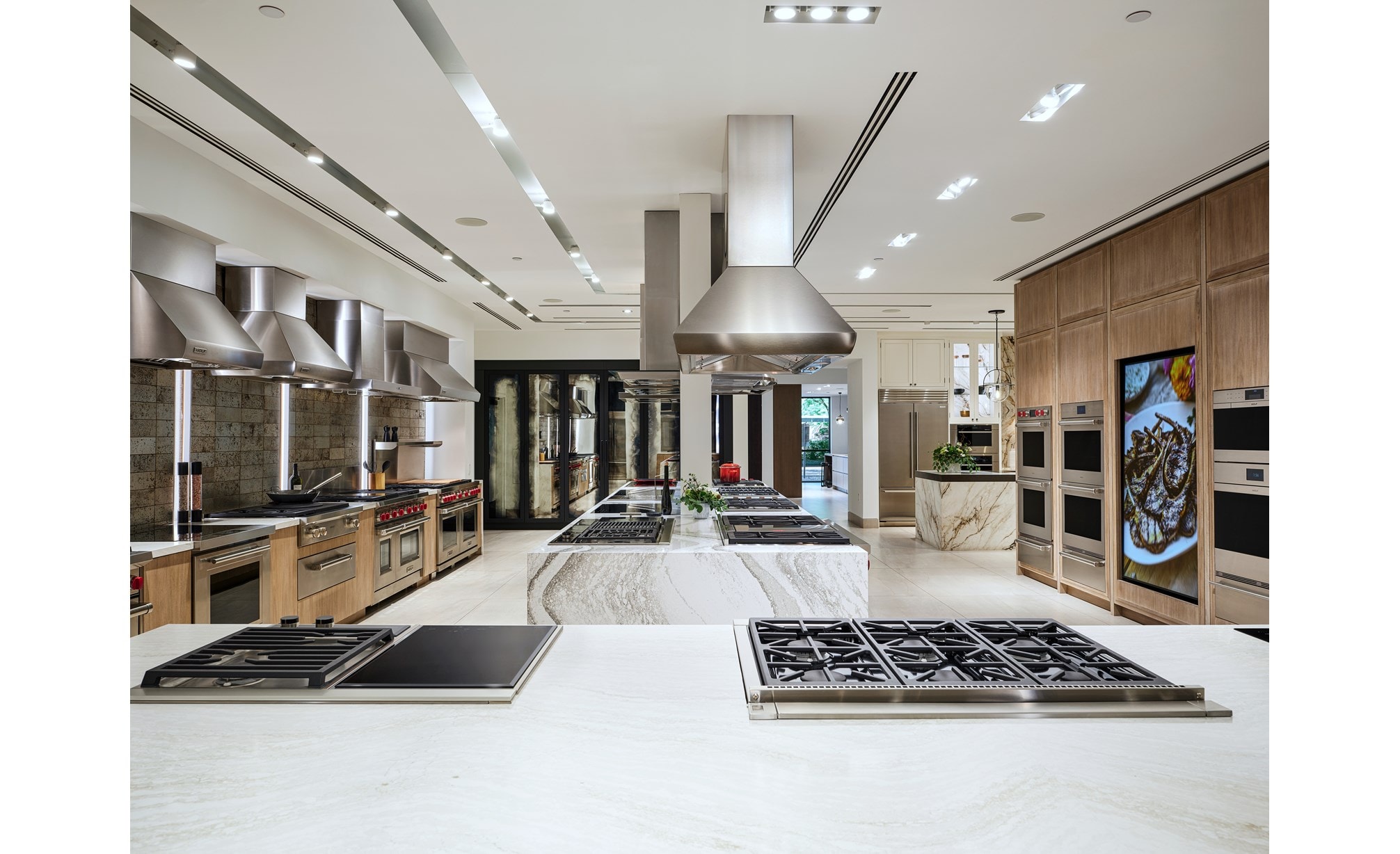A vast assortment of different Wolf Appliances including ovens, ranges, cooktops, and ventiliation systems.