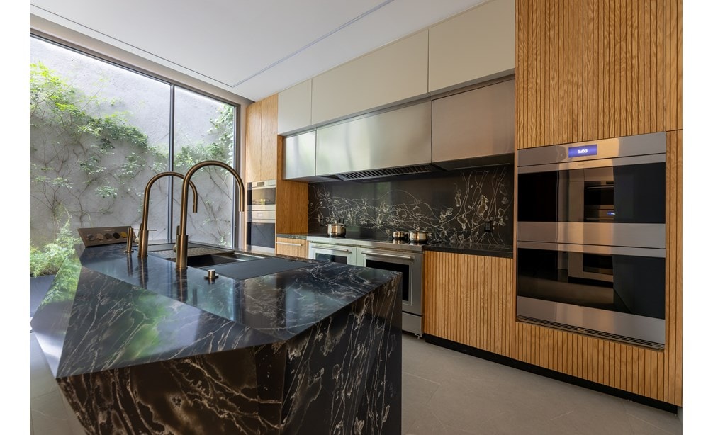 Inside the Sub-Zero, Wolf, and Cove Showroom in Mexico City featuring built-in Wolf appliances like ovens and ranges.