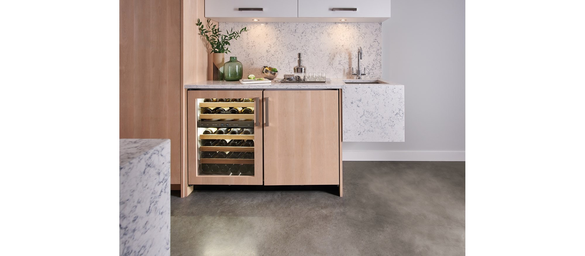 Sub-Zero 24" Undercounter Refrigerator Freezer Panel Ready (UC-24CI) shows your favorite beverages and appetizers can be kept nearby.