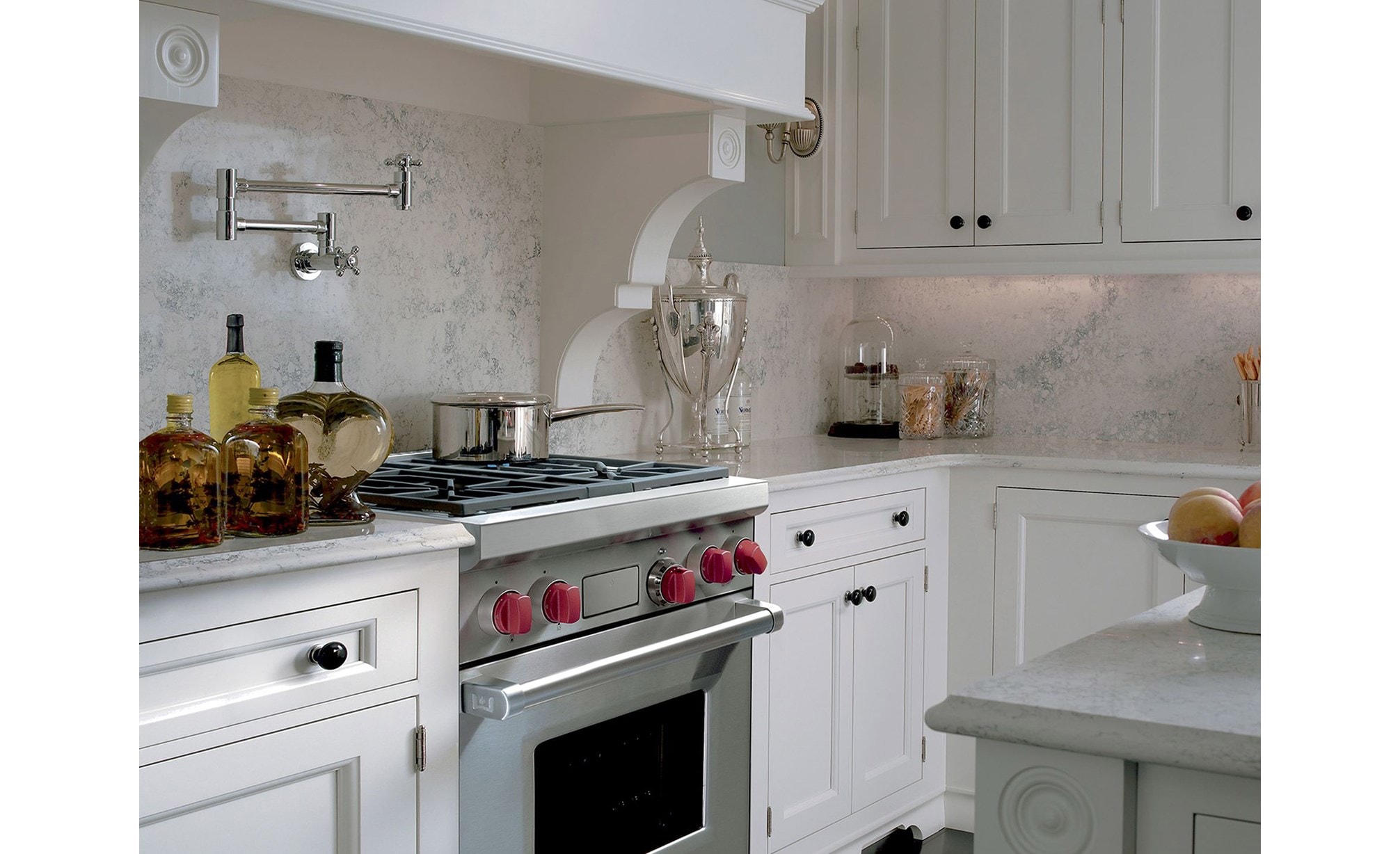 The Wolf 30" Dual Fuel Range 4 Burner (DF304) Cooktop shown beautifully integrated into a classic kitchen design.