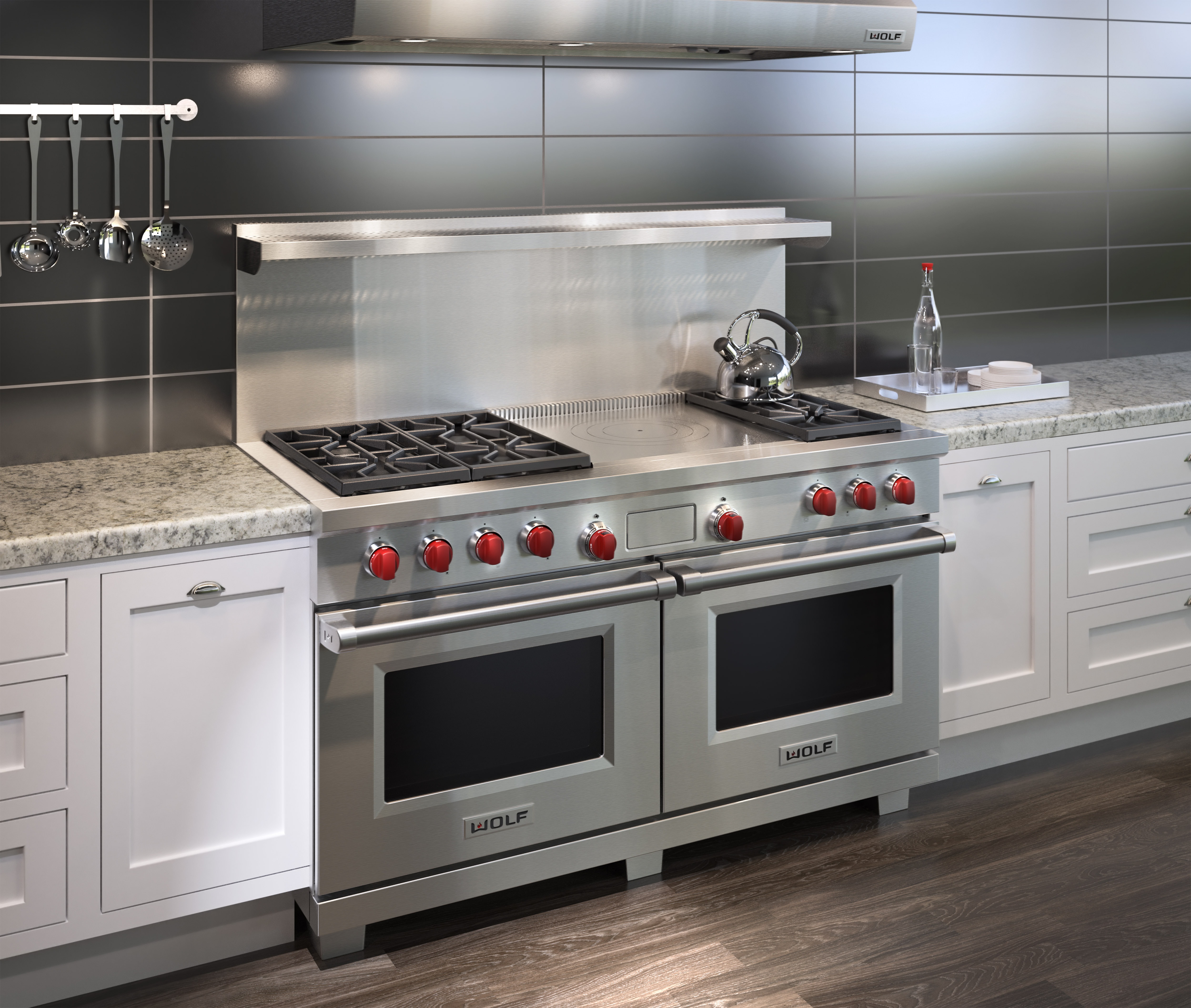 The Wolf 60" Dual Fuel Range 6 Burner French Top (DF606F) shown with light marble countertops along with classic white kitchen cabinetry