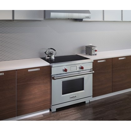 The Wolf 36" Professional Induction Range (IR365PE/S/PH) shown with Wolf Two-Slice-Toaster with Red Knob (WGTR102S)