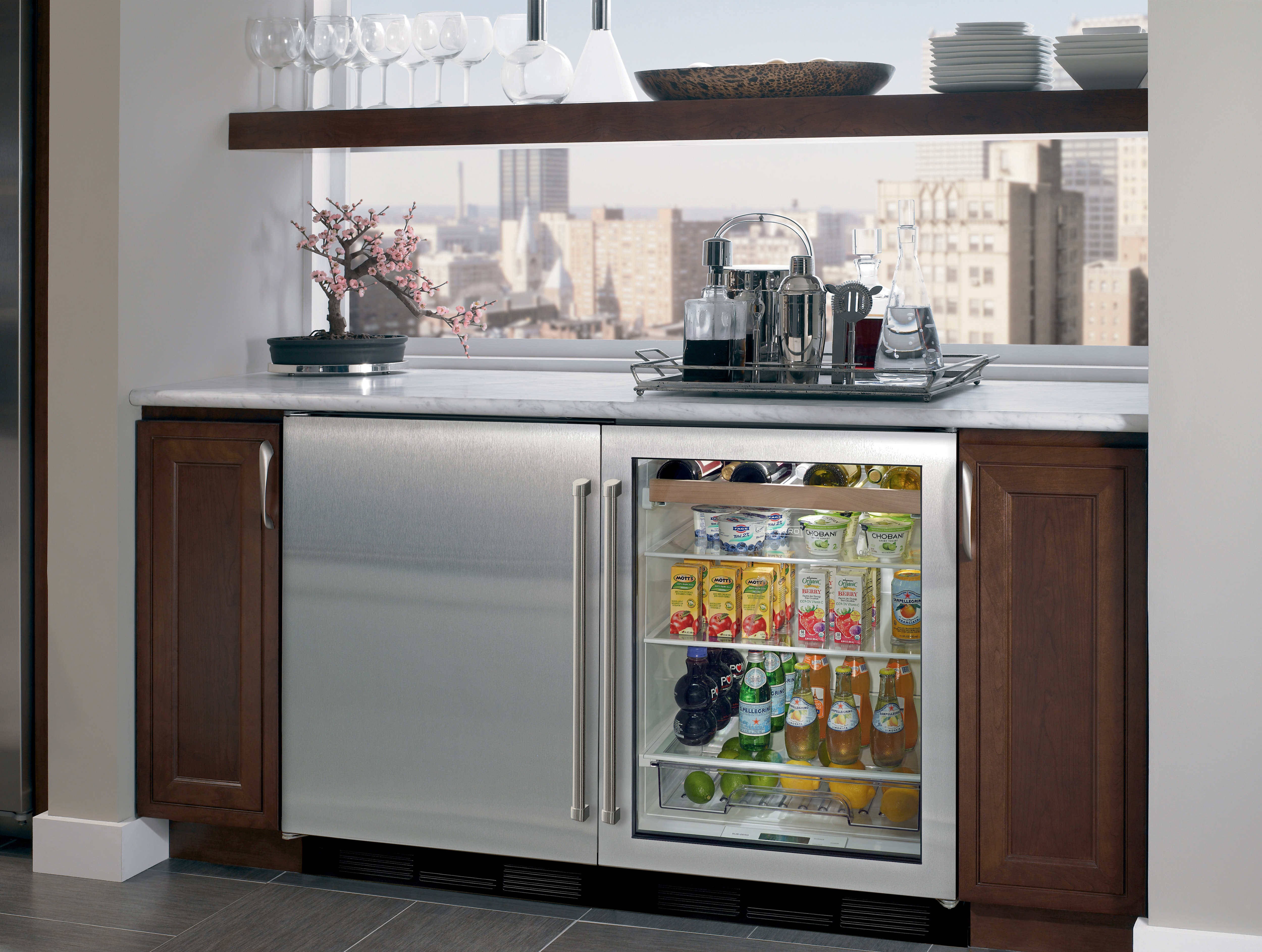 Sub-Zero 24" Undercounter Refrigerator Freezer (UC-24CI) paired with 24" Undercounter Beverage Center (UC-24BG/S) provides refrigeration in any room.