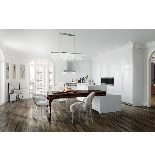 La estufa de 4 quemadores sellada de 30" Wolf (SRT304) exhibida en combinación en un espacio de cocina abierta contemporánea blanca nítida.