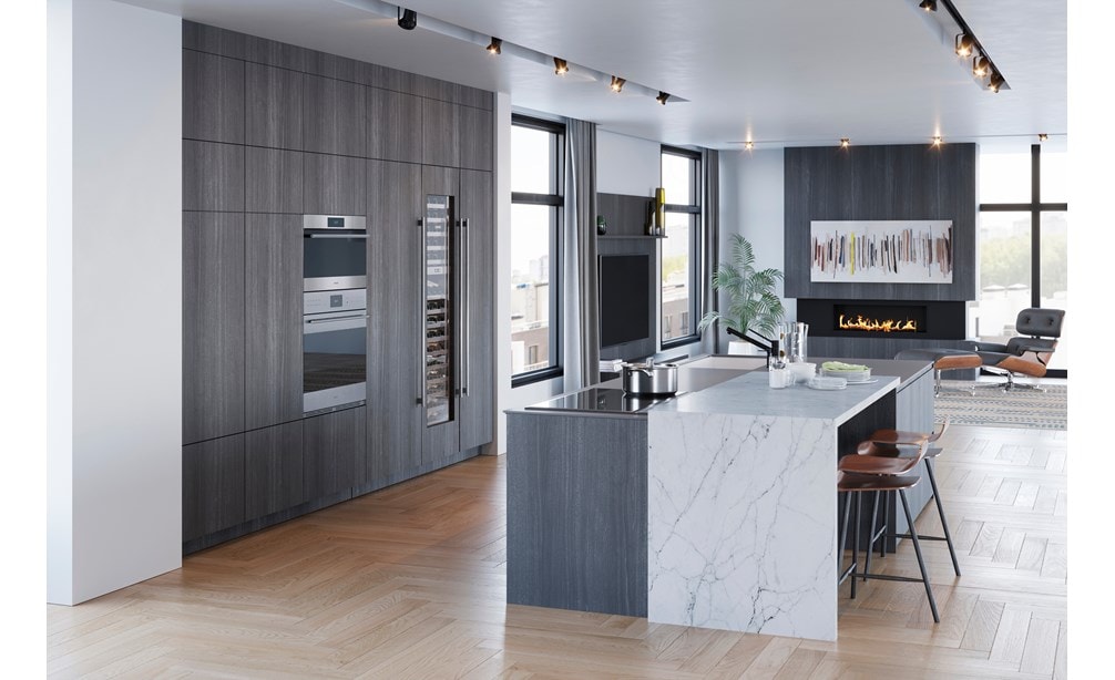 Horno de vapor con convección transicional de la serie E de 30" Wolf con tubería (CSOP3050TE/S/T) exhibido en gabinetes de madera gris personalizados en una cocina y sala de estar minimalistas