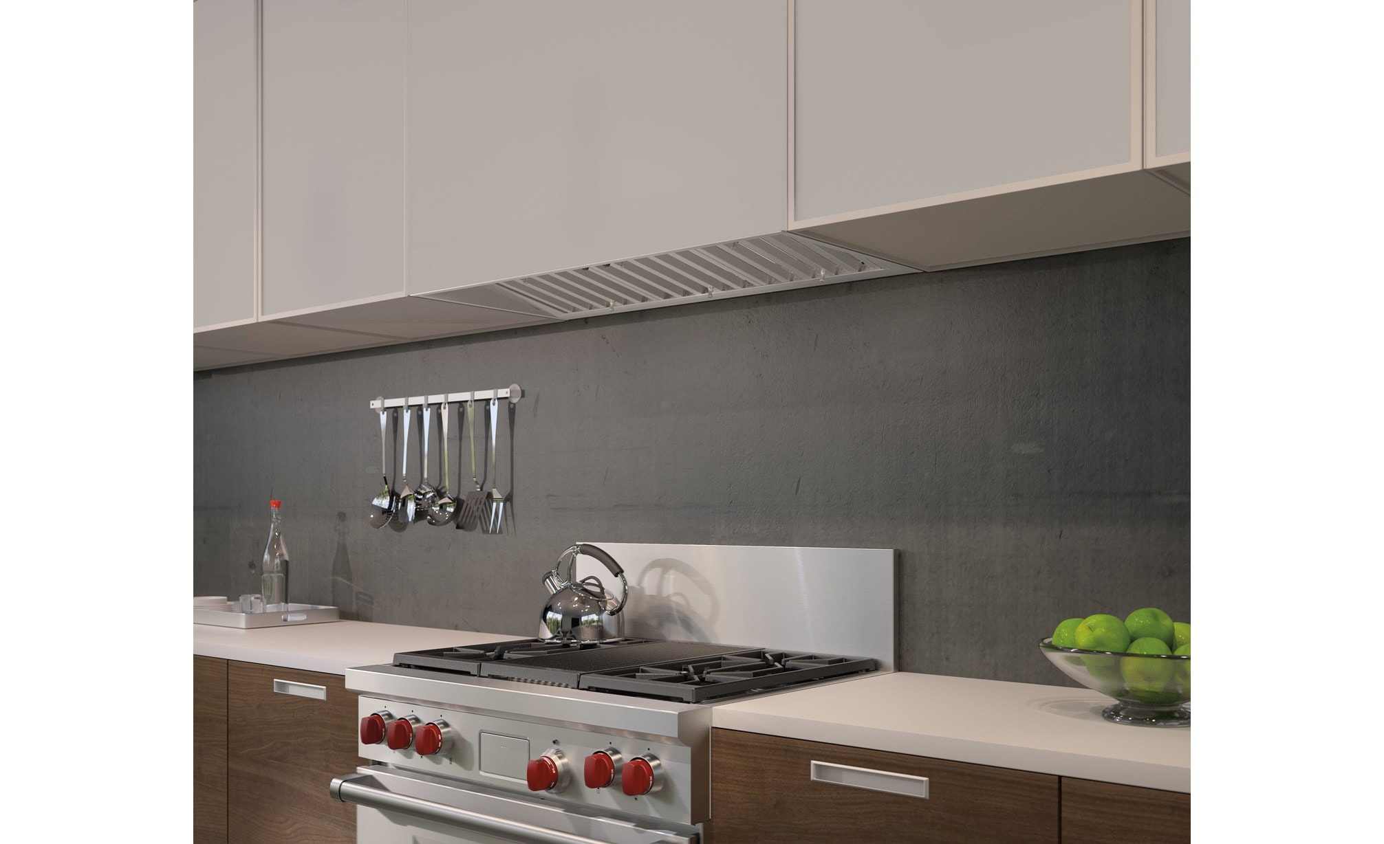 El revestimiento de campana extractora Pro de 40" Wolf - 19" de profundidad (PL401912) exhibido combinándose a la perfección en gabinetes lisos sin manija con un diseño mínimo de cocina