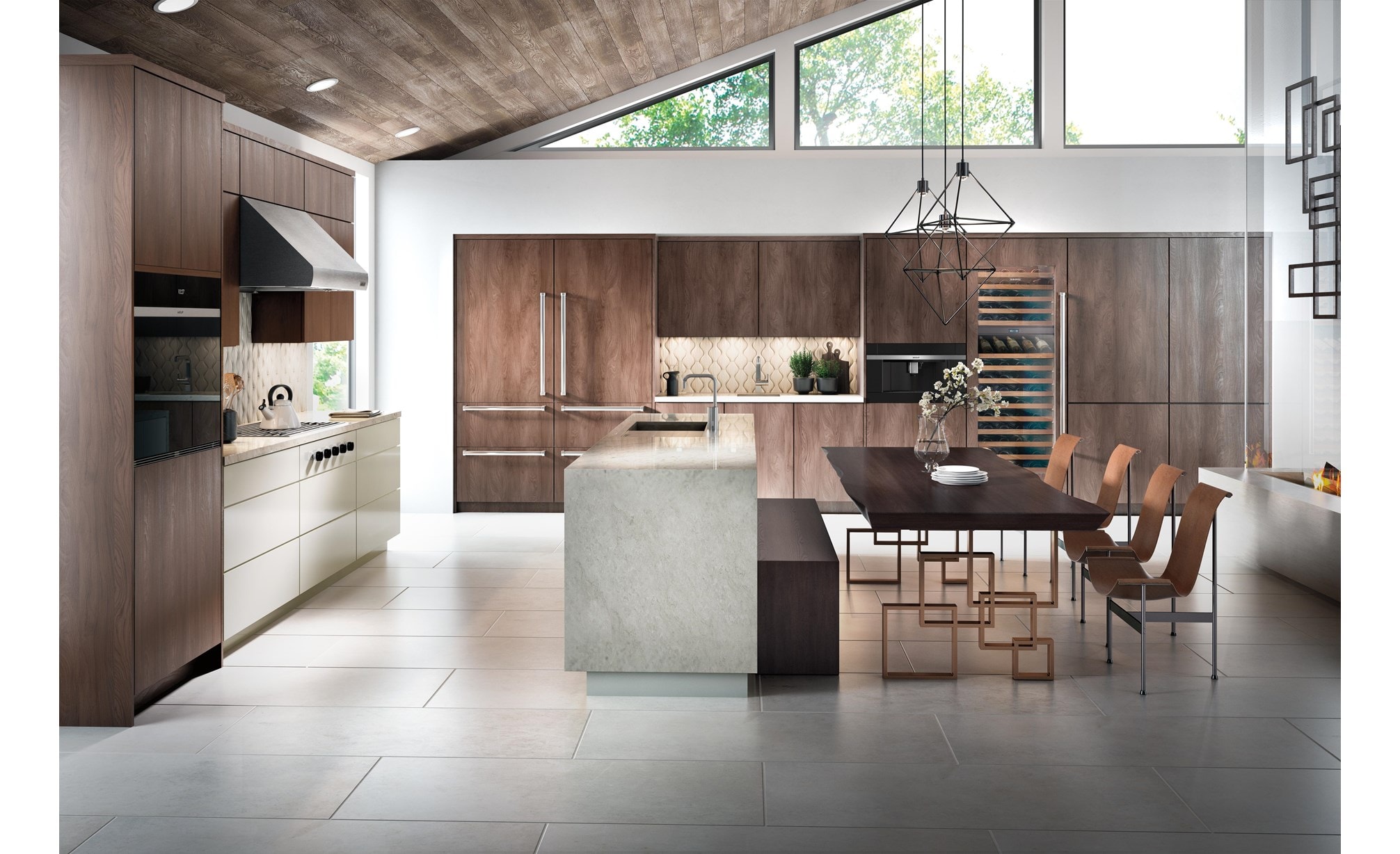 La campana extractora de pared Pro de 36" Wolf - 27" de profundidad (PW362718) exhibida en un gran concepto de cocina de lujo con gabinetes de paneles de madera lisa