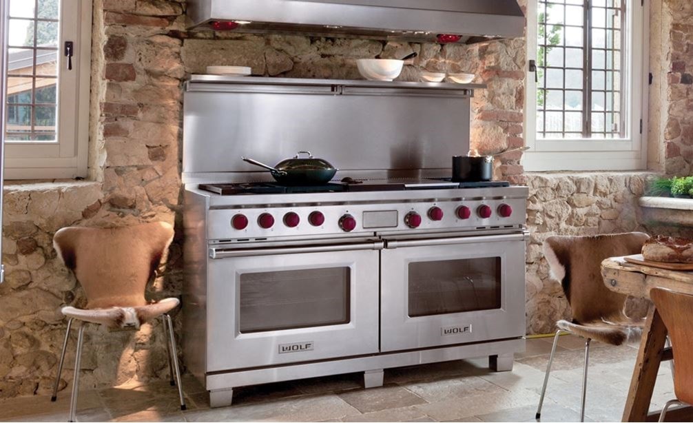 The Wolf 60&quot; Dual Fuel Range 6 Burner Infrared Charbroiler Griddle (DF606CG) shown with Wolf 60&quot; Pro Wall Hood - 27&quot; Depth (PW602718)