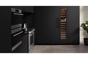 Sub-Zero Designer Series Refrigerator integrated into kitchen with black matte custom cabinetry